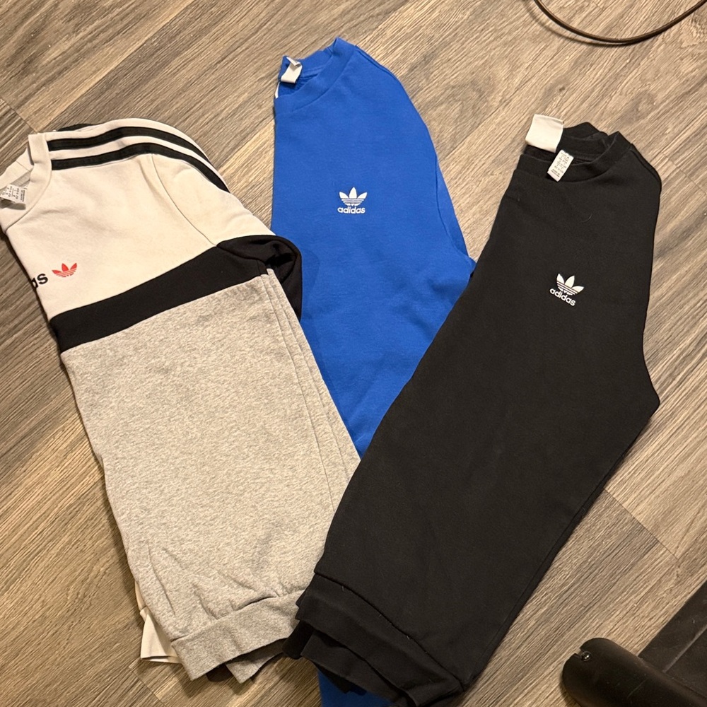 Adidas Kids' Black, Blue, and Gray crewnecks.